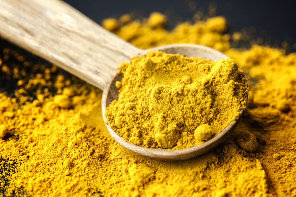 closeup-tumeric-powder-spice-spoon.jpg